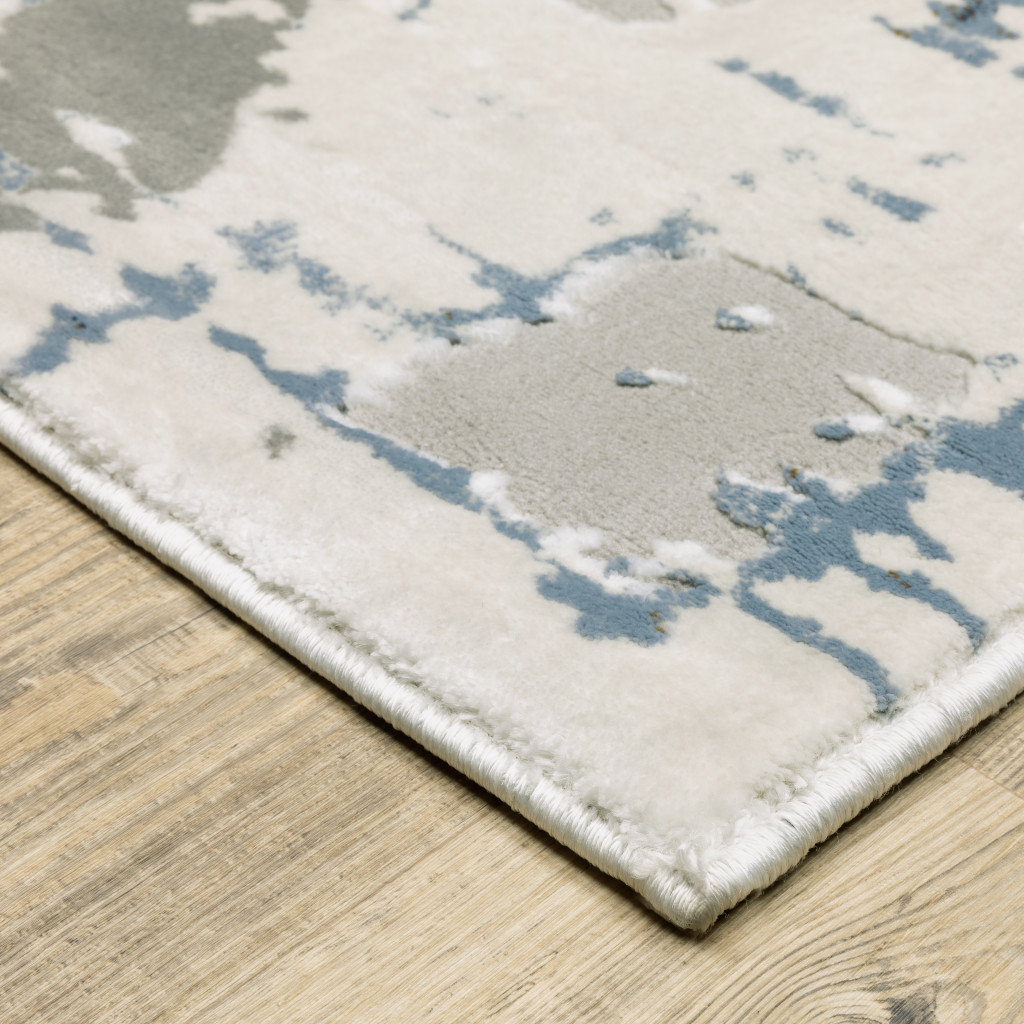 2 X 8 grey Blue Brown Ivory And Deep Blue Abstract Power Loom Stain Resistant Runner Rug