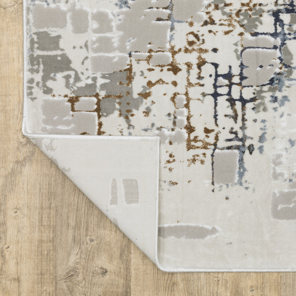 2" X 8" Grey Blue Brown Ivory And Deep Blue Abstract Power Loom Stain Resistant Runner Rug