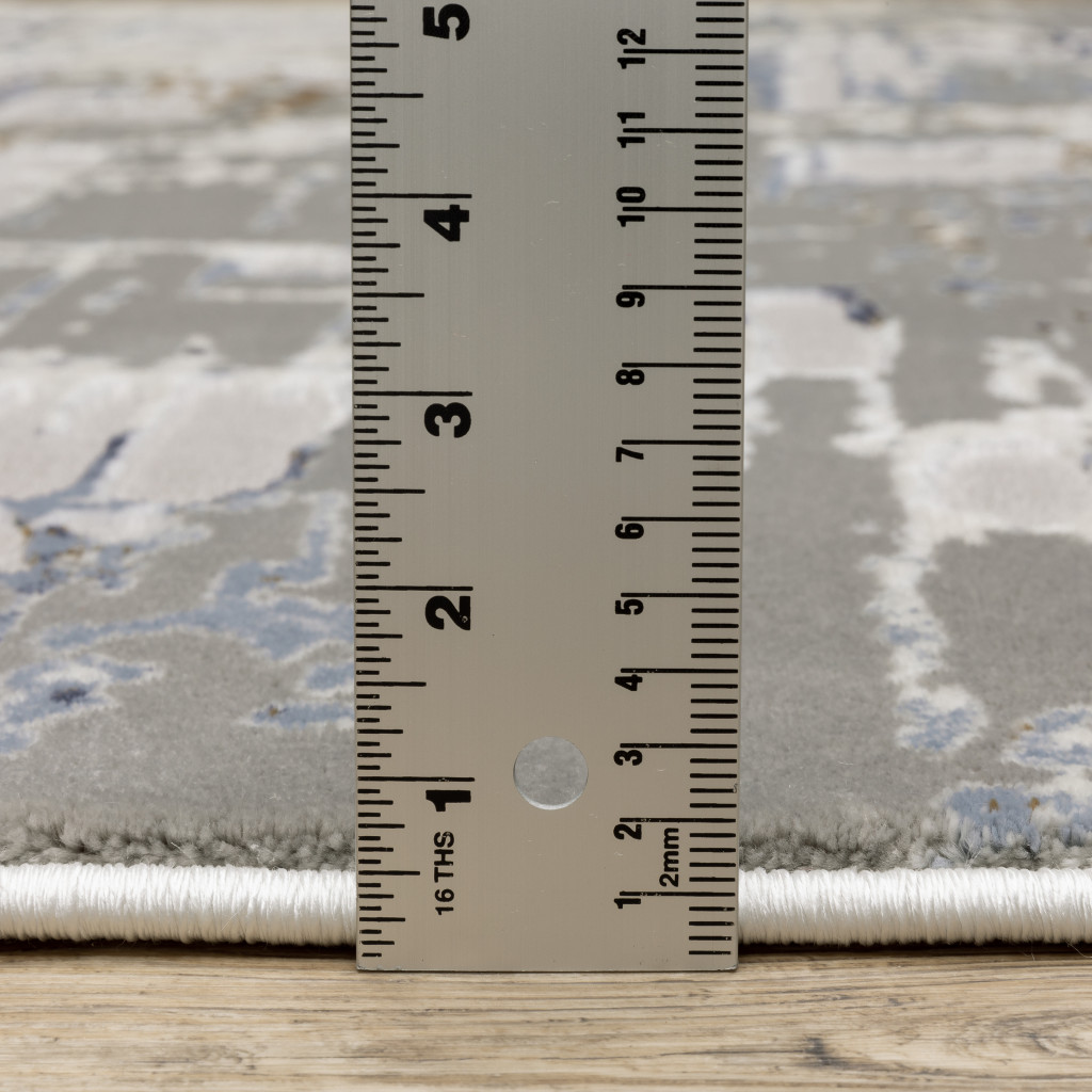 2" X 8" Grey Blue Brown Ivory And Deep Blue Abstract Power Loom Stain Resistant Runner Rug