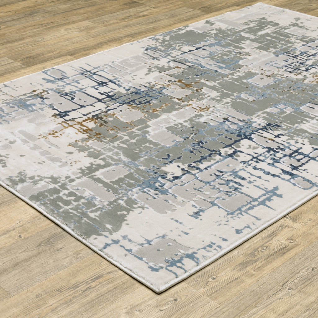 5" X 8" Grey Blue Brown Ivory And Deep Blue Abstract Power Loom Stain Resistant Area Rug