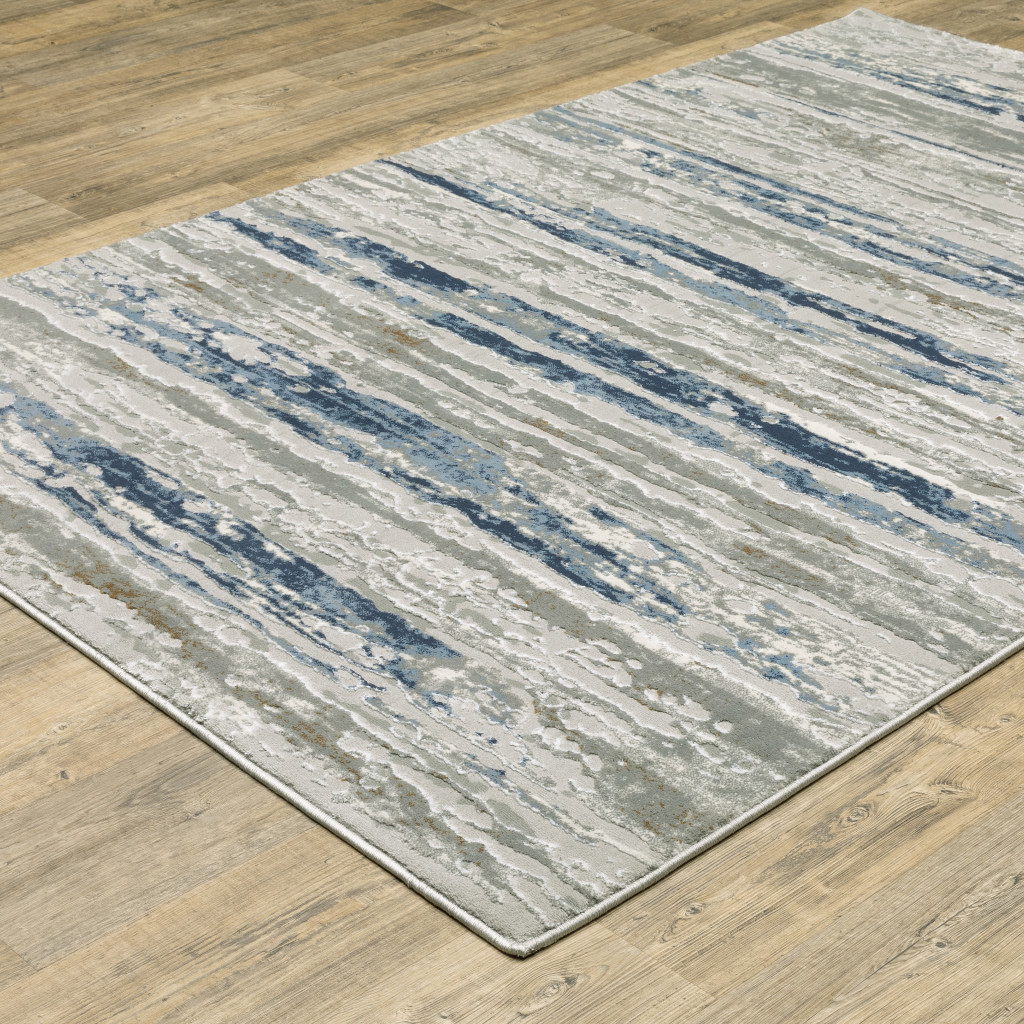 10" X 13" Blue Ivory Grey Light Blue And Brown Abstract Power Loom Stain Resistant Area Rug