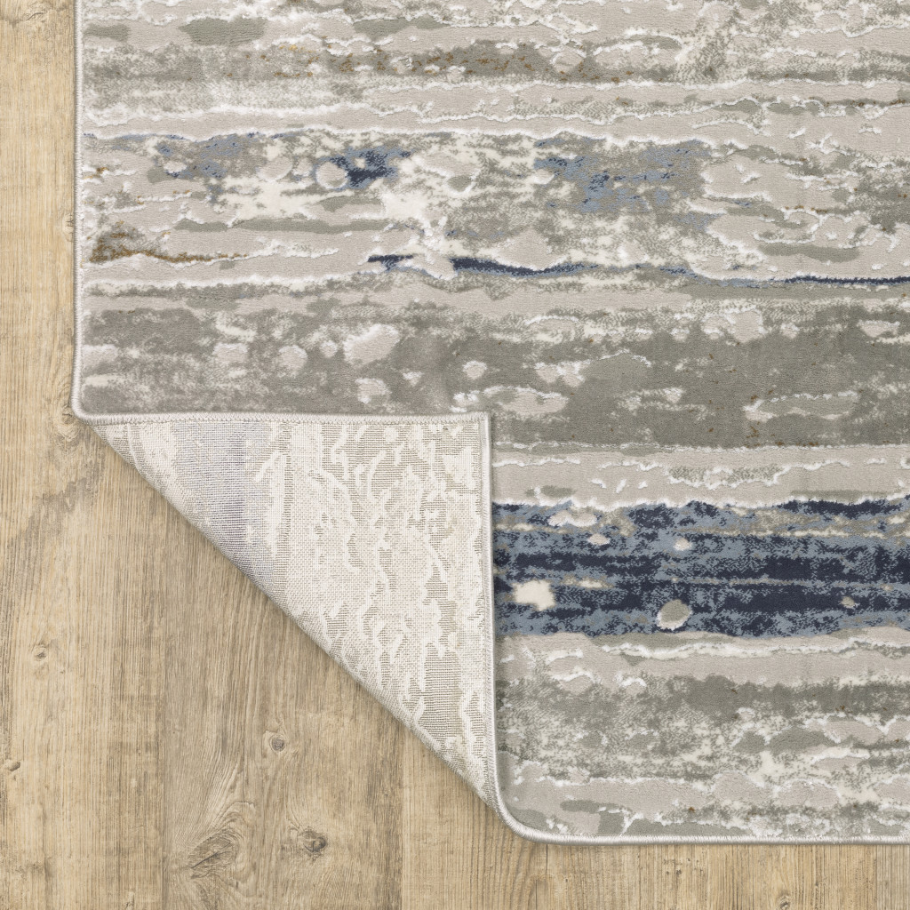 10" X 13" Blue Ivory Grey Light Blue And Brown Abstract Power Loom Stain Resistant Area Rug