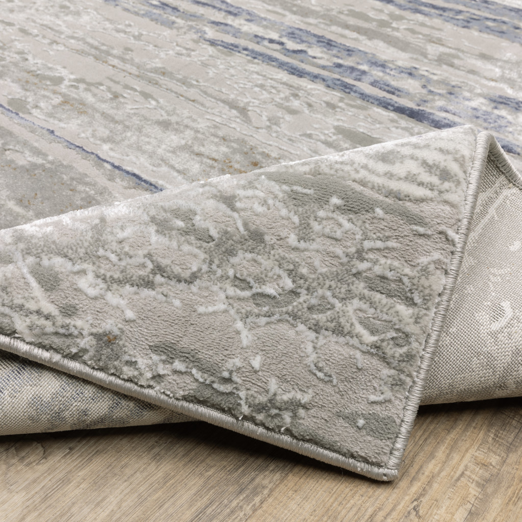 10" X 13" Blue Ivory Grey Light Blue And Brown Abstract Power Loom Stain Resistant Area Rug