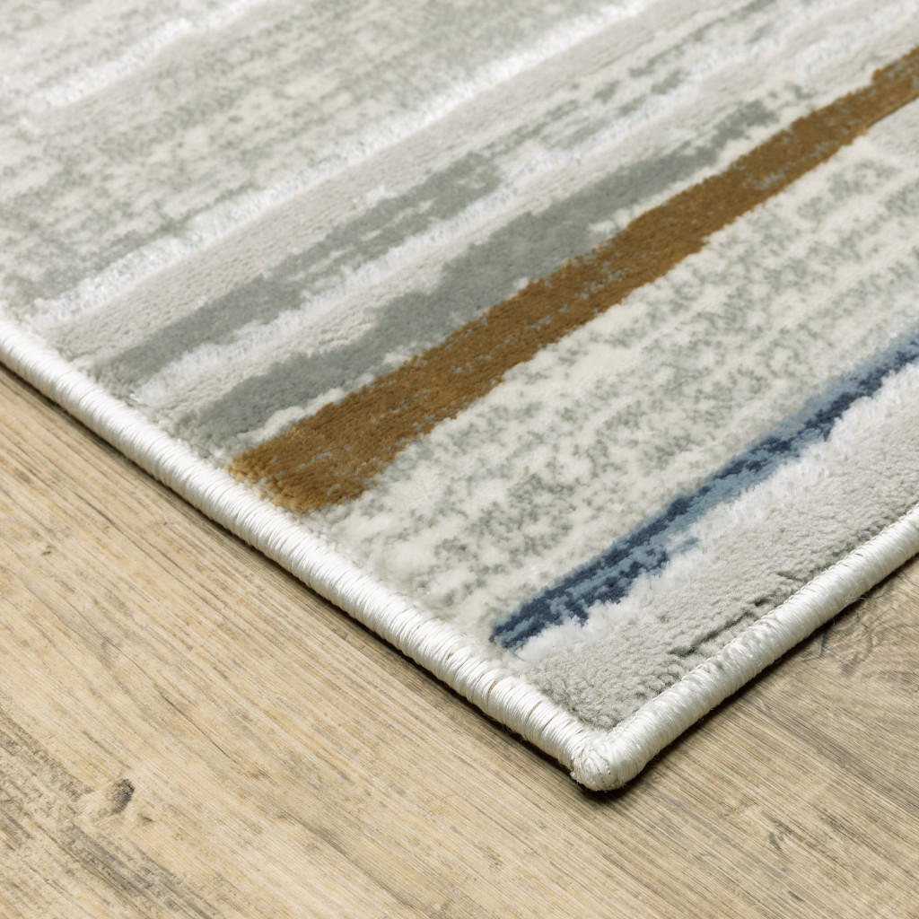 2" X 8" Grey Blue Ivory Brown Beige And Navy Abstract Power Loom Stain Resistant Runner Rug