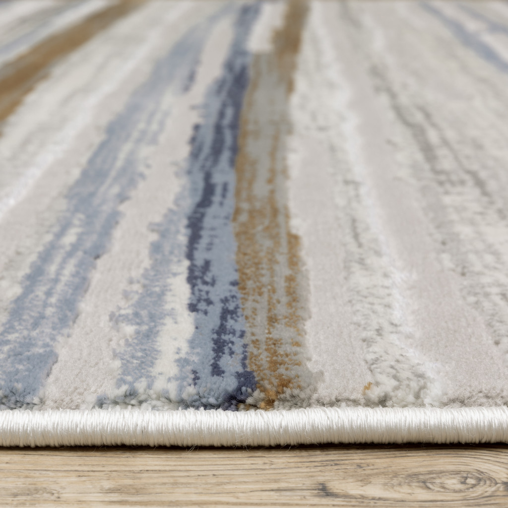 2" X 8" Grey Blue Ivory Brown Beige And Navy Abstract Power Loom Stain Resistant Runner Rug
