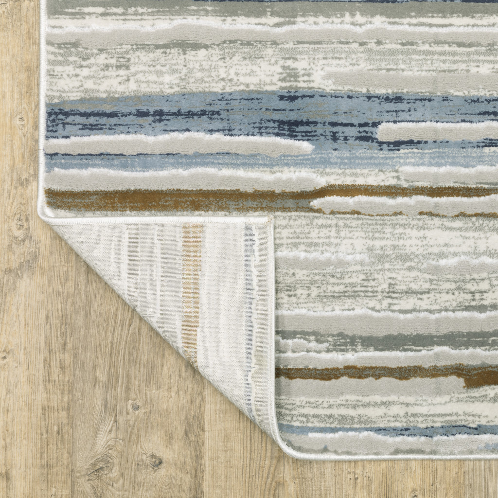 2" X 8" Grey Blue Ivory Brown Beige And Navy Abstract Power Loom Stain Resistant Runner Rug