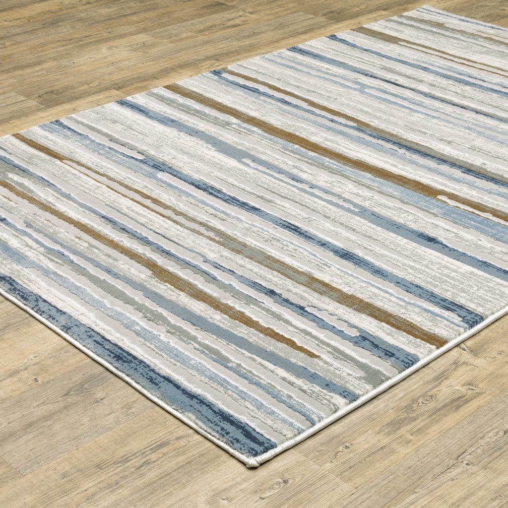 3" X 5" Grey Blue Ivory Brown Beige And Navy Abstract Power Loom Stain Resistant Area Rug