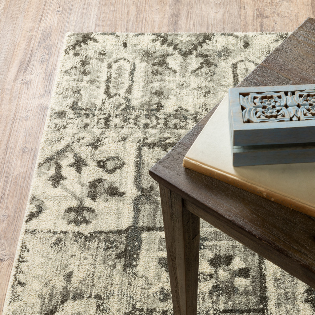 6" X 9" Grey Ivory And Brown Oriental Power Loom Stain Resistant Area Rug