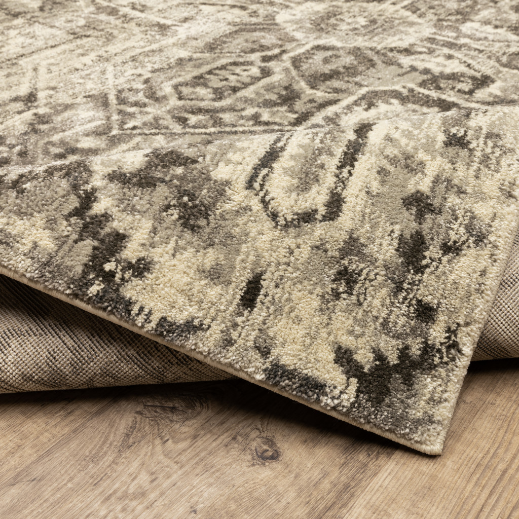 6" X 9" Grey Ivory And Brown Oriental Power Loom Stain Resistant Area Rug