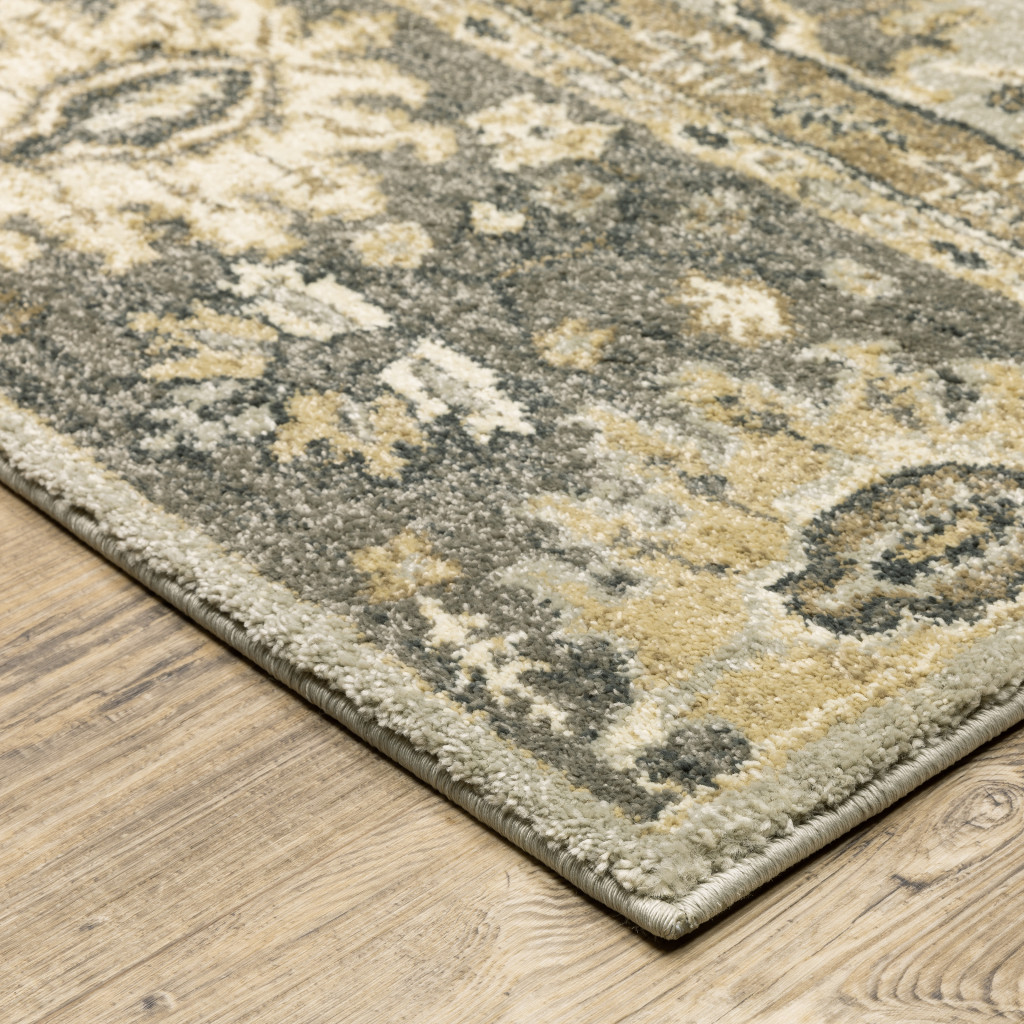 6" X 9" Grey Brown Tan And Beige Oriental Power Loom Stain Resistant Area Rug