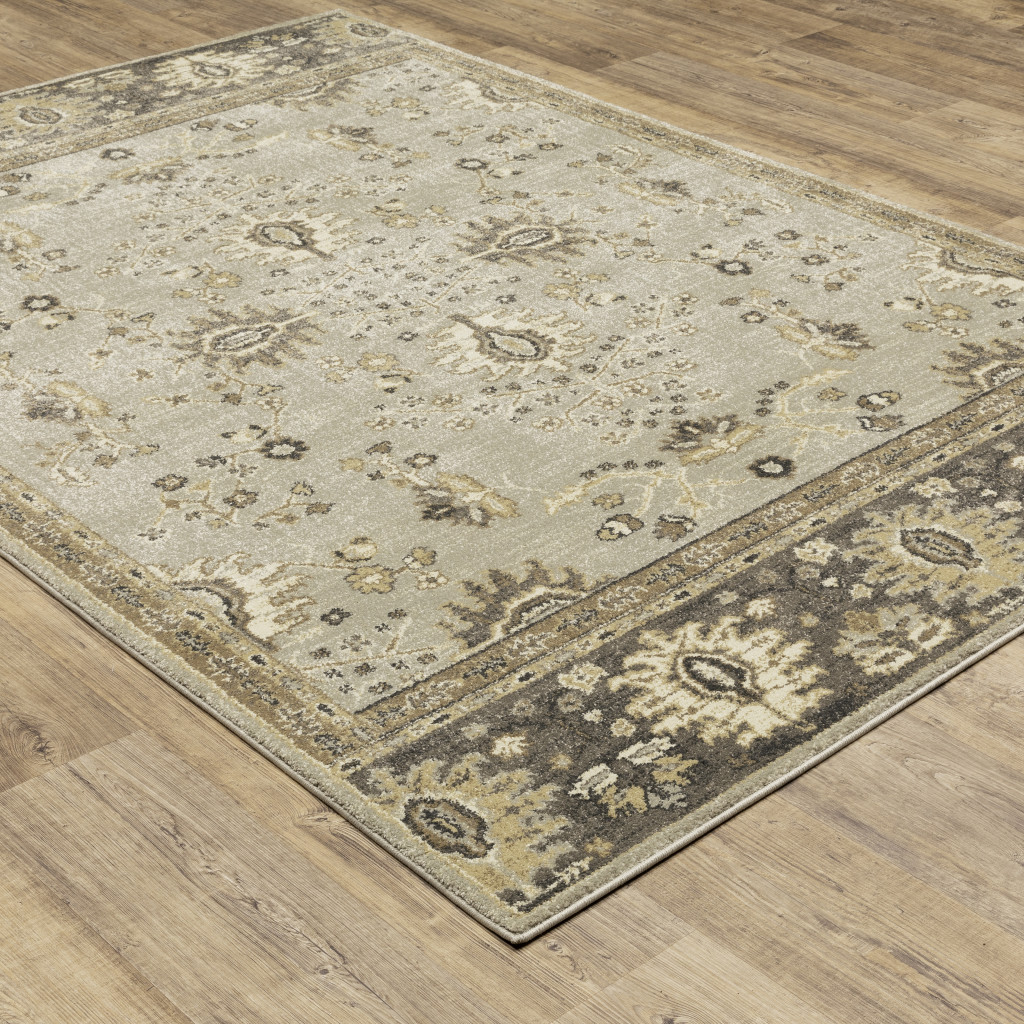 6" X 9" Grey Brown Tan And Beige Oriental Power Loom Stain Resistant Area Rug
