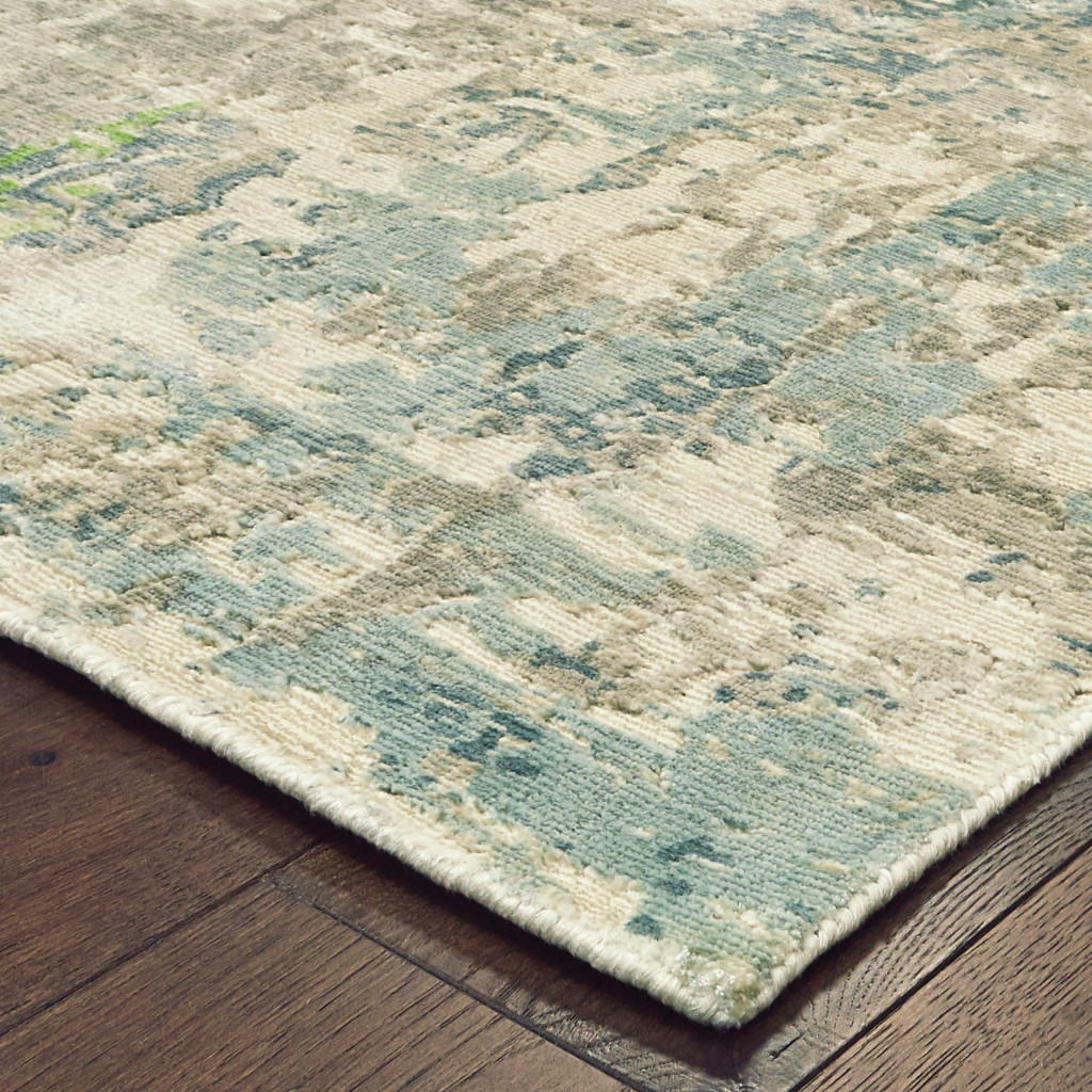 6" X 9" Blue And Green Abstract Hand Loomed Stain Resistant Area Rug