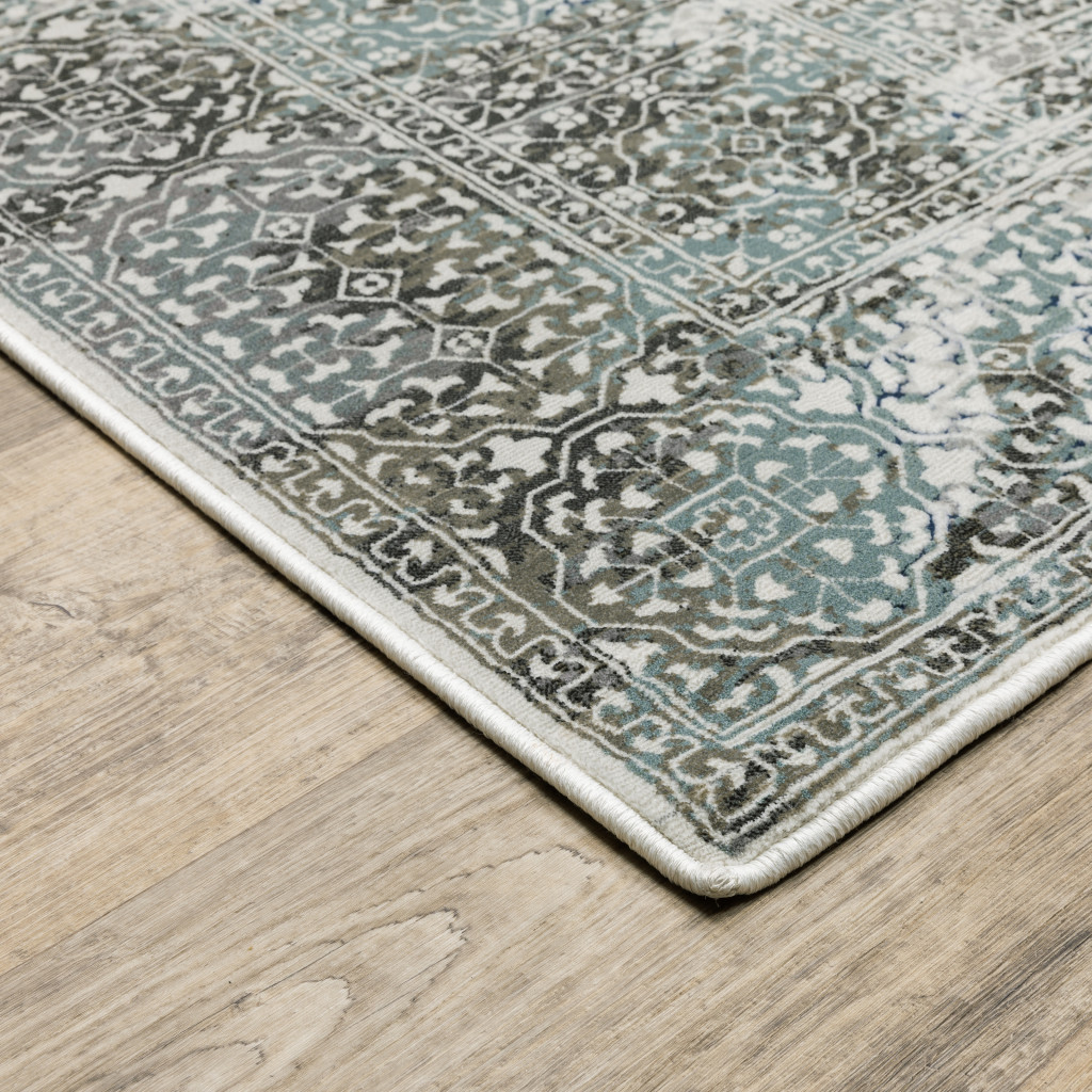 2" X 8" Ivory Grey Charcoal Blue And Rust Oriental Power Loom Stain Resistant Runner Rug