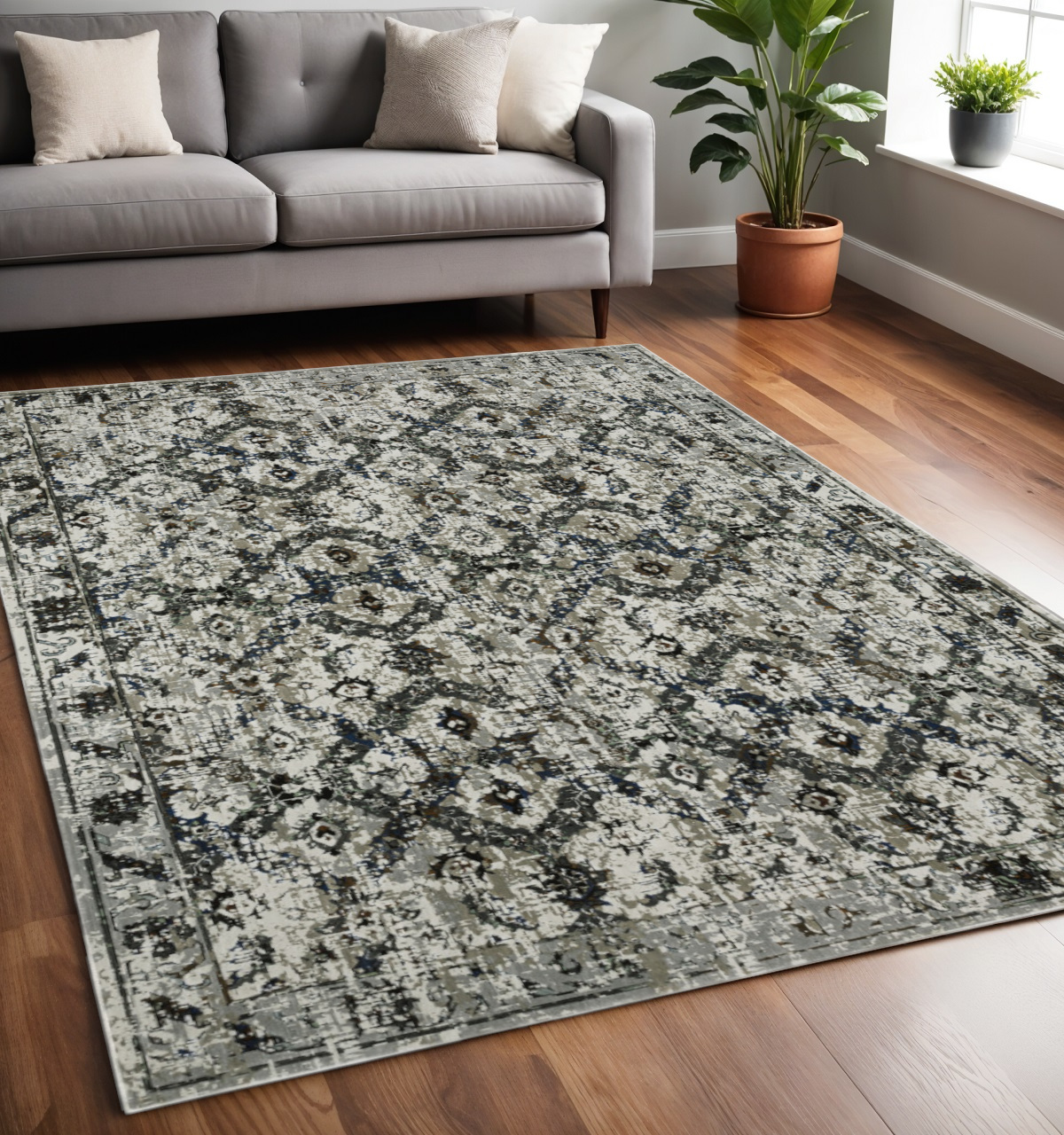 5" X 8" Ivory and Black Oriental Power Loom Area Rug
