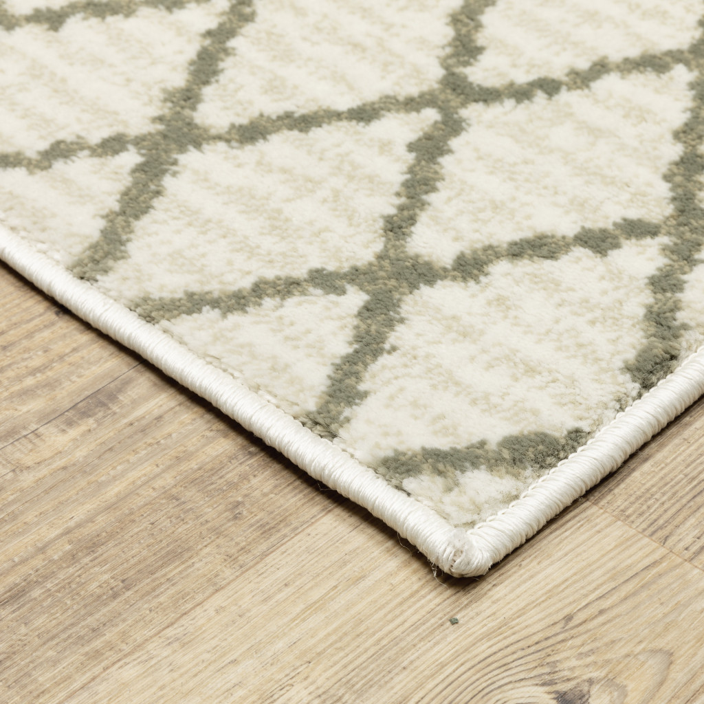 2" X 8" Ivory And Grey Geometric Power Loom Stain Resistant Runner Rug