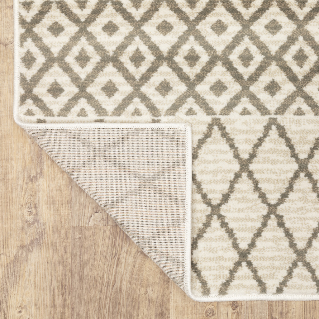 2" X 8" Ivory And Grey Geometric Power Loom Stain Resistant Runner Rug