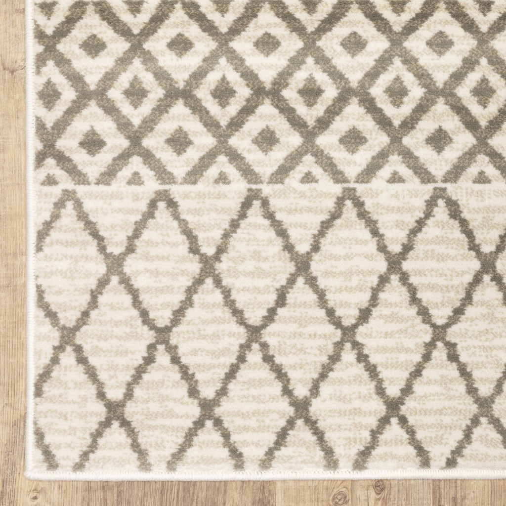 2" X 8" Ivory And Grey Geometric Power Loom Stain Resistant Runner Rug