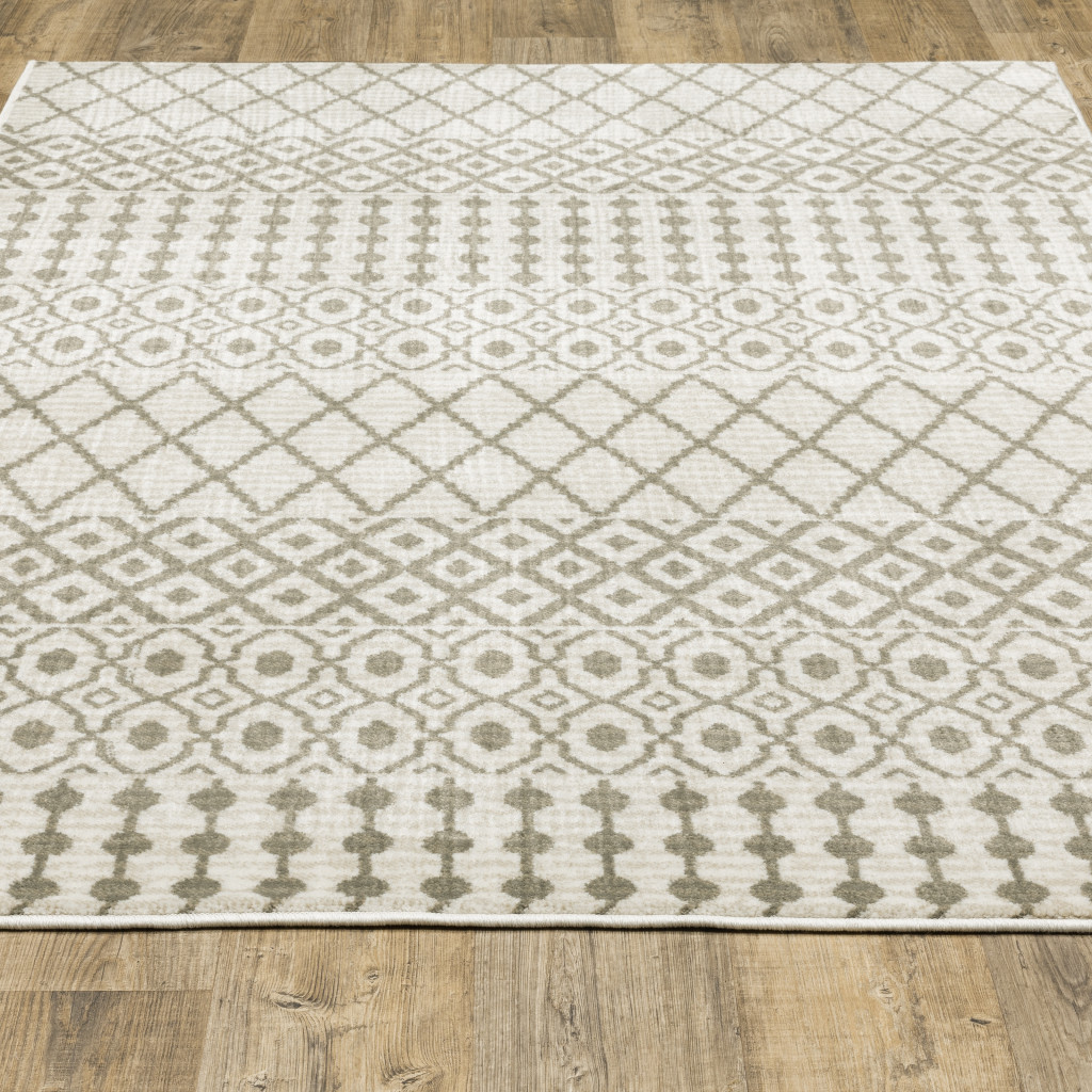 5" X 7" Ivory And Grey Geometric Power Loom Stain Resistant Area Rug