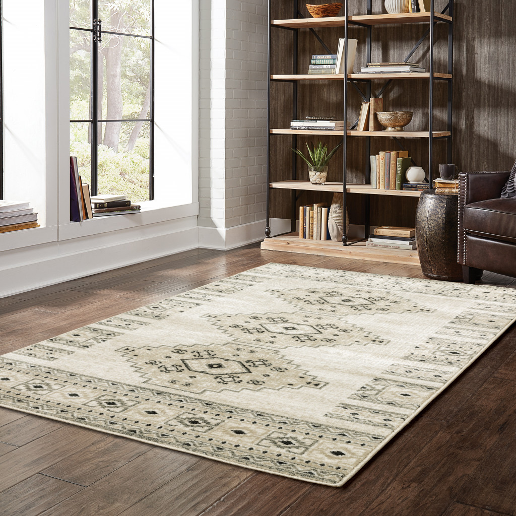6" X 9" Ivory Grey Black And Ivory Southwestern Power Loom Stain Resistant Area Rug