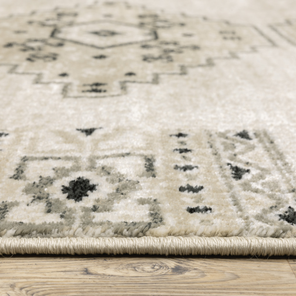 10" X 13" Ivory Grey Black And Ivory Southwestern Power Loom Stain Resistant Area Rug