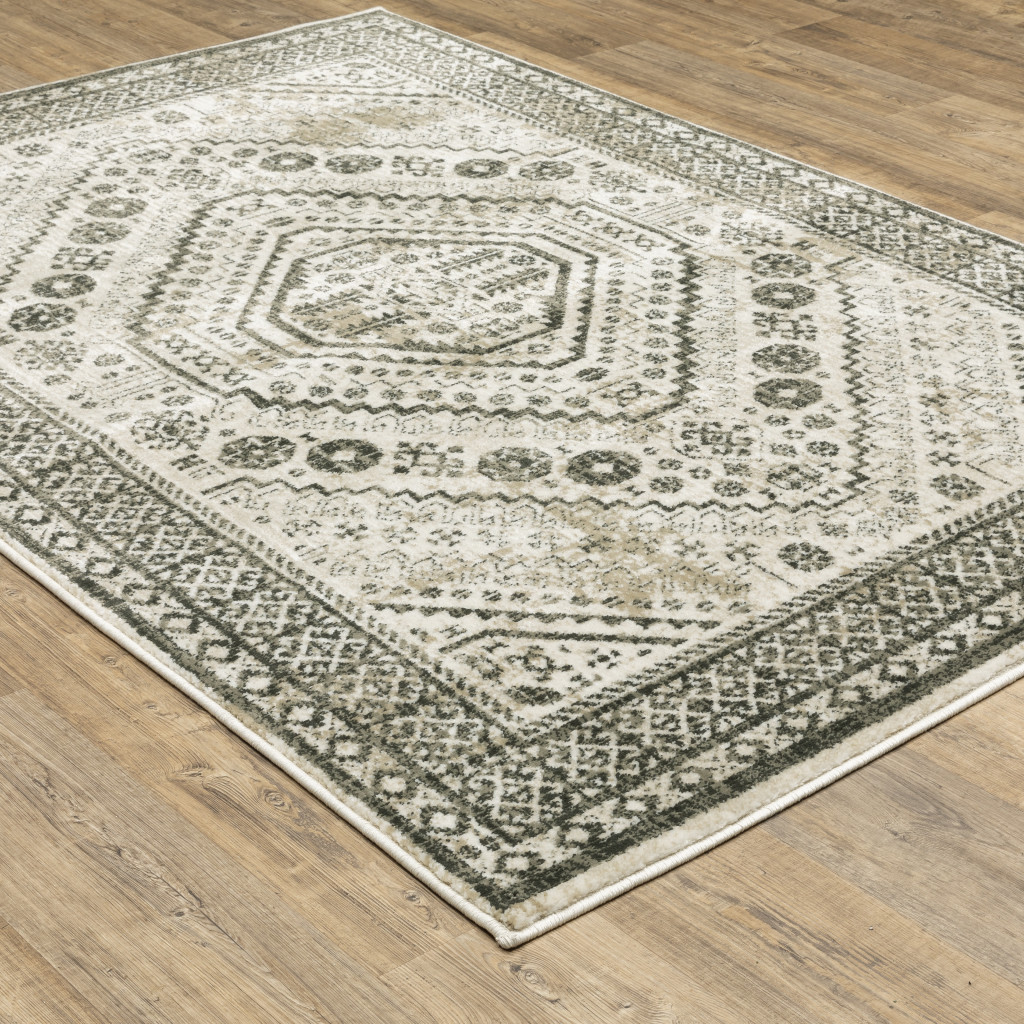 8" X 10" Ivory Grey Black And Ivory Oriental Power Loom Stain Resistant Area Rug