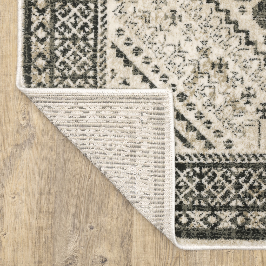 8" X 10" Ivory Grey Black And Ivory Oriental Power Loom Stain Resistant Area Rug