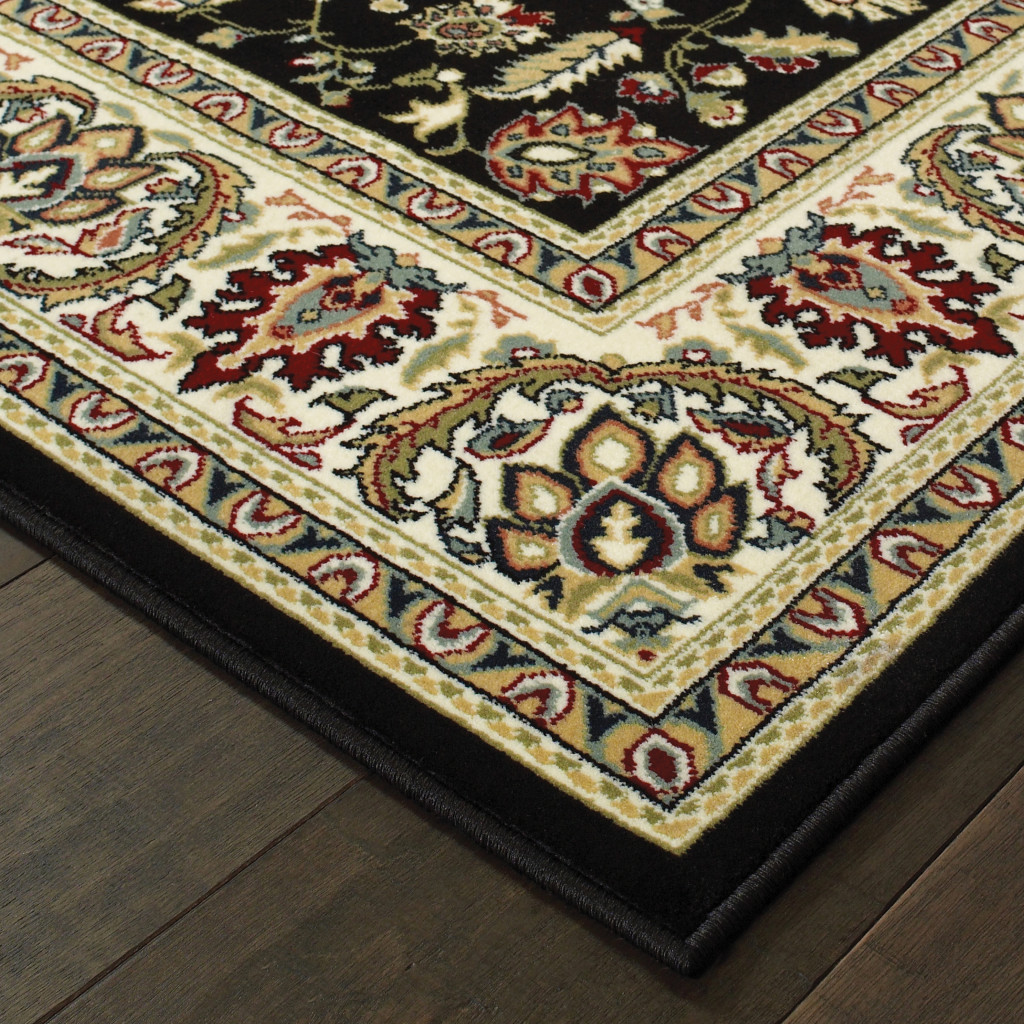 2" X 4" Black And Ivory Oriental Power Loom Stain Resistant Area Rug