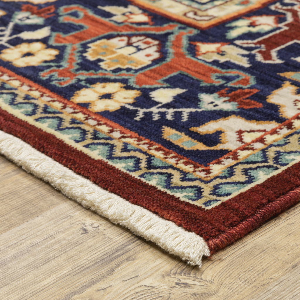 2" X 3" Red Blue Orange And Beige Oriental Power Loom Stain Resistant Area Rug With Fringe