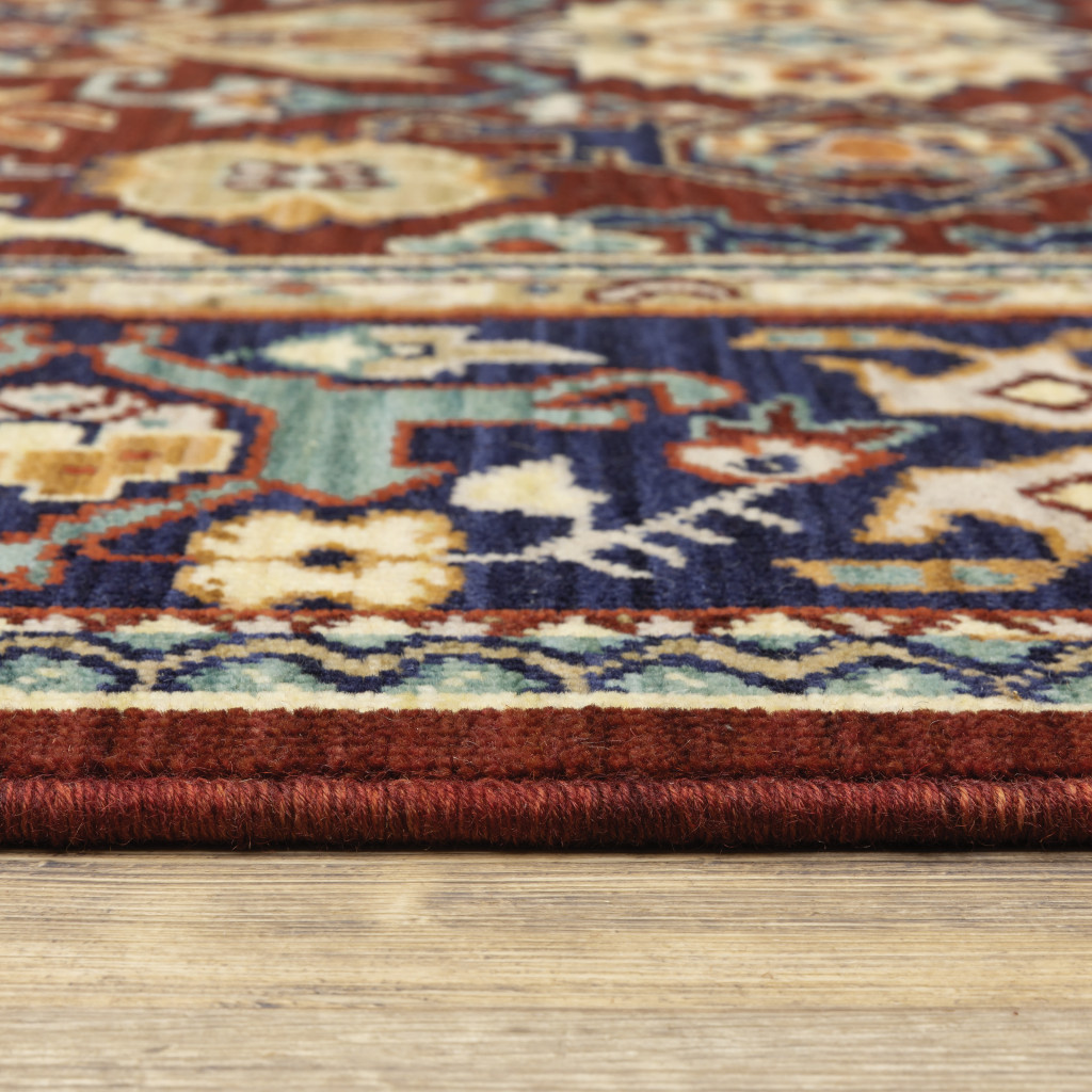 2" X 3" Red Blue Orange And Beige Oriental Power Loom Stain Resistant Area Rug With Fringe