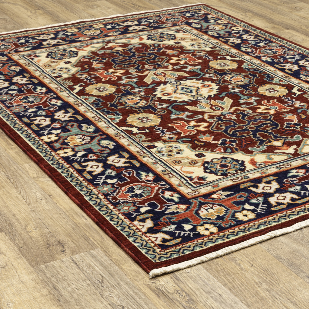2" X 3" Red Blue Orange And Beige Oriental Power Loom Stain Resistant Area Rug With Fringe