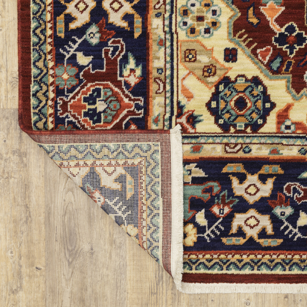 2" X 3" Red Blue Orange And Beige Oriental Power Loom Stain Resistant Area Rug With Fringe