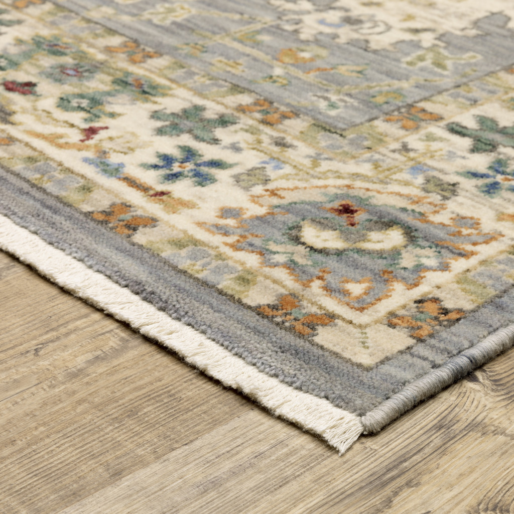 8" X 11" Grey Ivory Orange Teal Green Charcoal Blue And Red Oriental Power Loom Stain Resistant Area Rug With Fringe