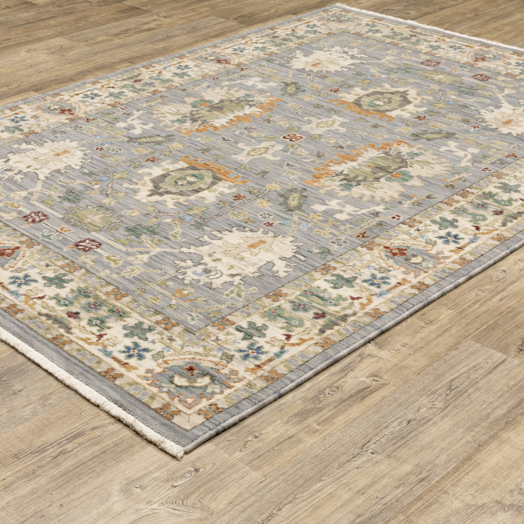 8" X 11" Grey Ivory Orange Teal Green Charcoal Blue And Red Oriental Power Loom Stain Resistant Area Rug With Fringe