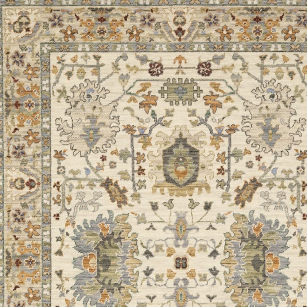 3" X 5" Ivory Grey Orange Green Blue And Red Oriental Power Loom Stain Resistant Area Rug With Fringe