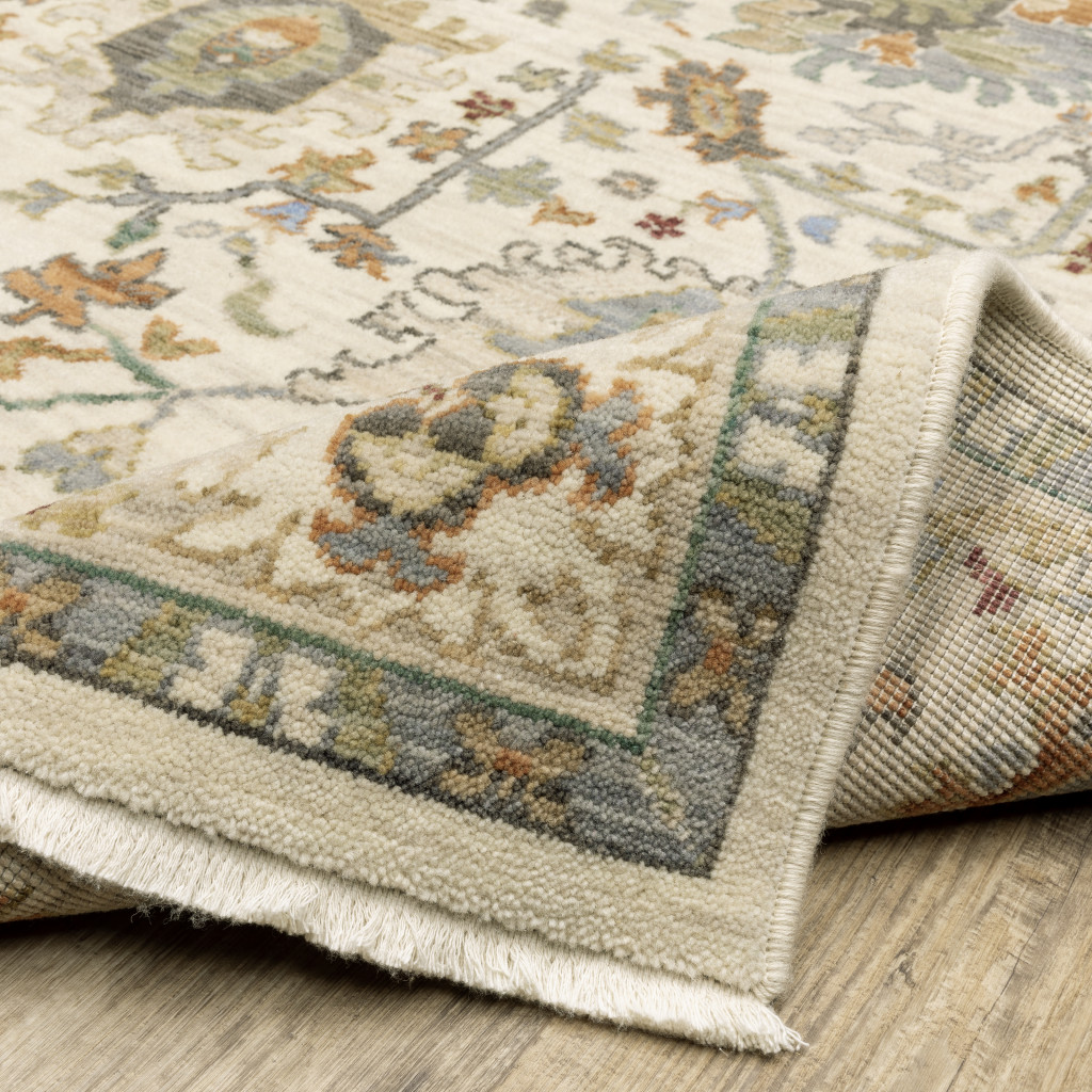 5" X 8" Brown And Ivory Oriental Power Loom Stain Resistant Area Rug With Fringe
