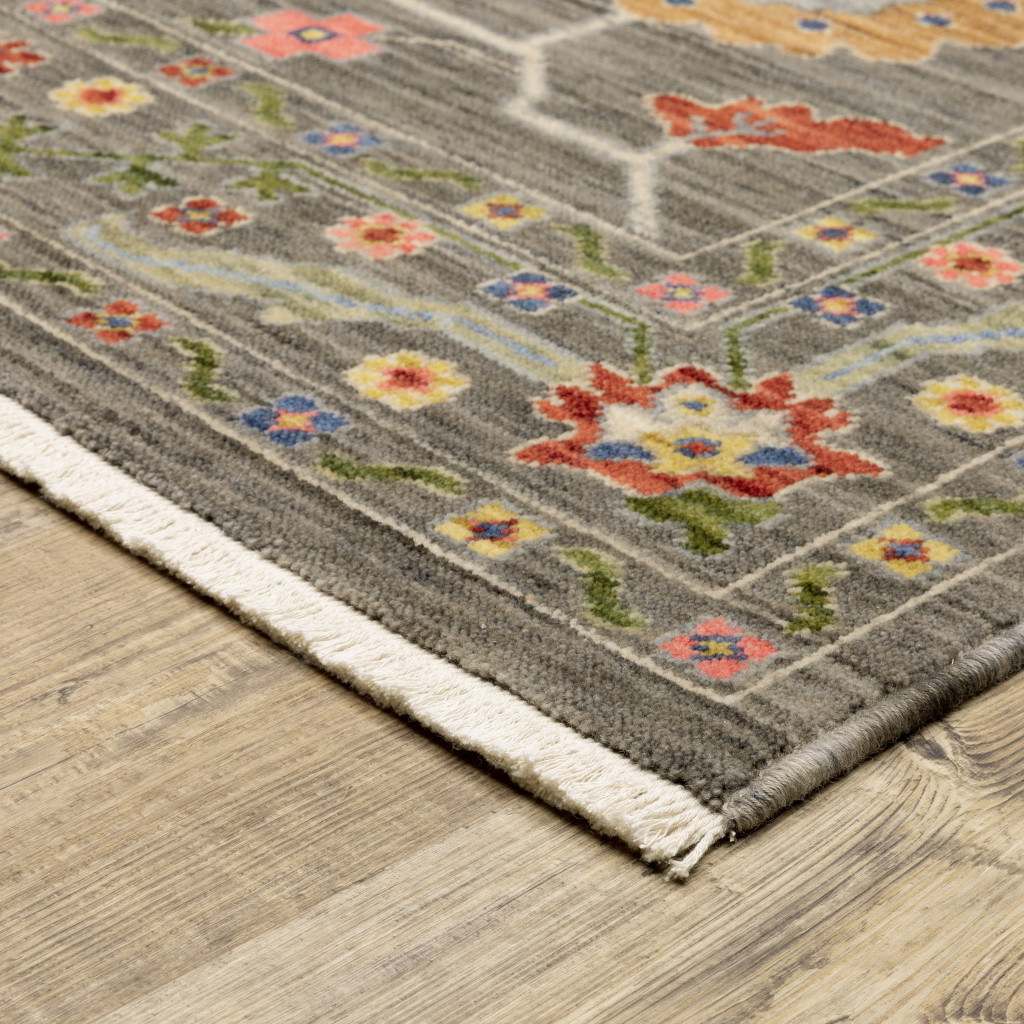 6" X 9" Grey Blue Pink Orange Rust Red Green And Ivory Oriental Power Loom Stain Resistant Area Rug With Fringe