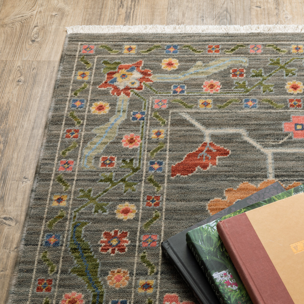 6" X 9" Grey Blue Pink Orange Rust Red Green And Ivory Oriental Power Loom Stain Resistant Area Rug With Fringe