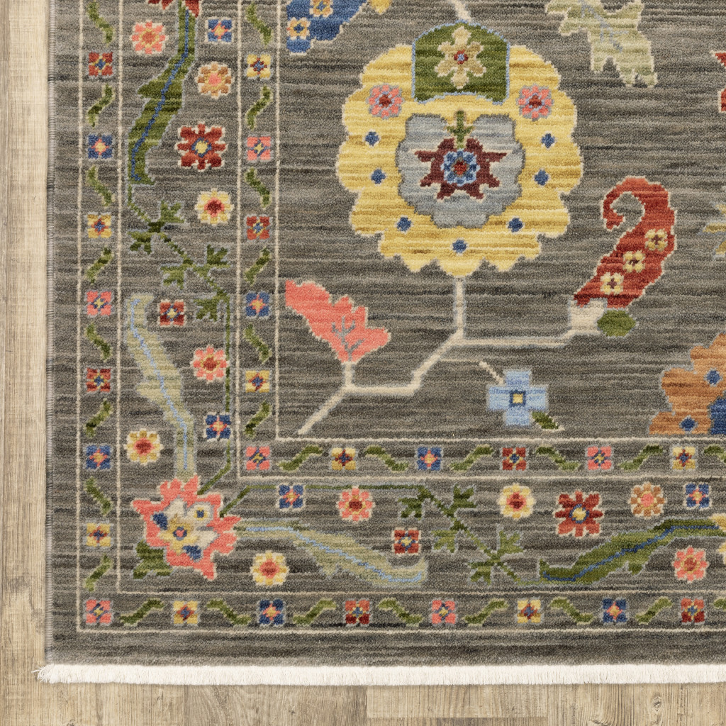 6" X 9" Grey Blue Pink Orange Rust Red Green And Ivory Oriental Power Loom Stain Resistant Area Rug With Fringe