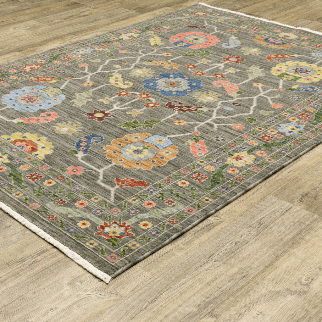 10" X 13" Grey Blue Pink Orange Rust Red Green And Ivory Oriental Power Loom Stain Resistant Area Rug With Fringe