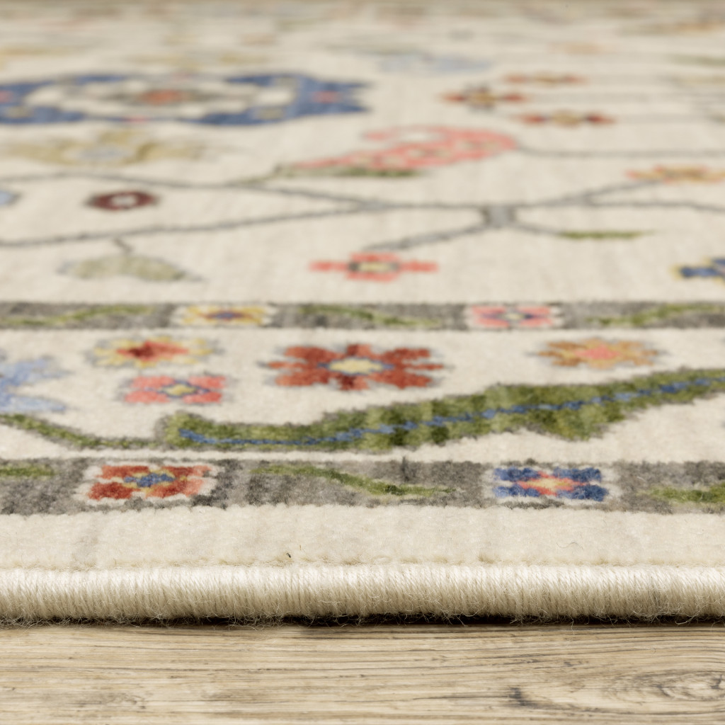 6" X 9" Ivory Green Blues Pink Yellow Rust Brown Tan And Grey Oriental Power Loom Stain Resistant Area Rug With Fringe