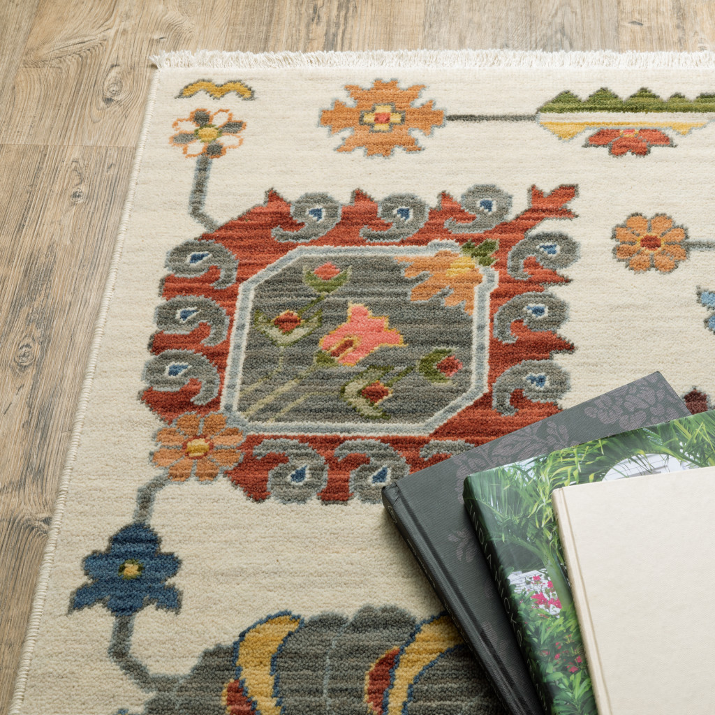 2" X 6" Ivory Yellow Rust Green Grey Pink Orange Blue And Grey Oriental Power Loom Stain Resistant Runner Rug With Fringe