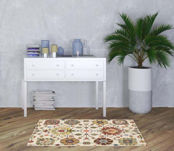 3" X 5" Ivory Yellow Rust Green Grey Pink Orange Blue And Grey Oriental Power Loom Stain Resistant Area Rug With Fringe