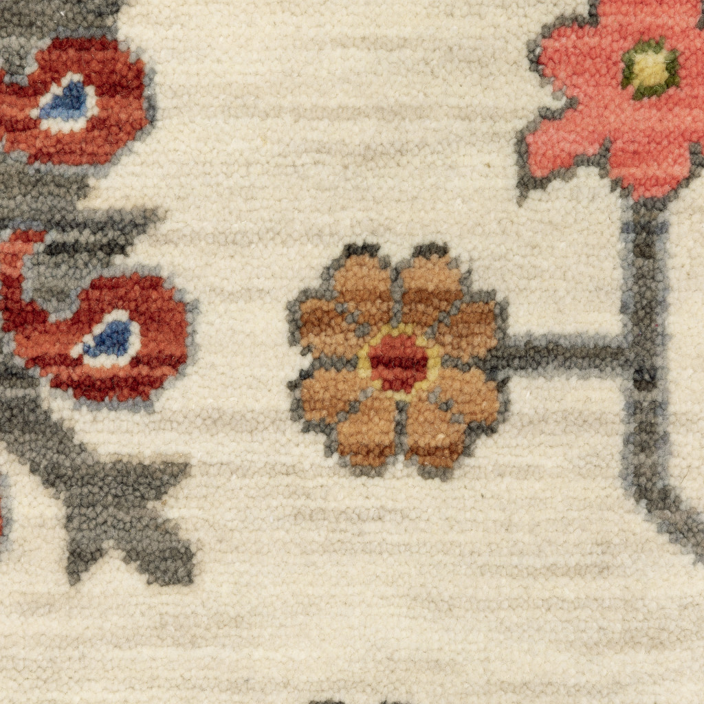 3" X 5" Ivory Yellow Rust Green Grey Pink Orange Blue And Grey Oriental Power Loom Stain Resistant Area Rug With Fringe