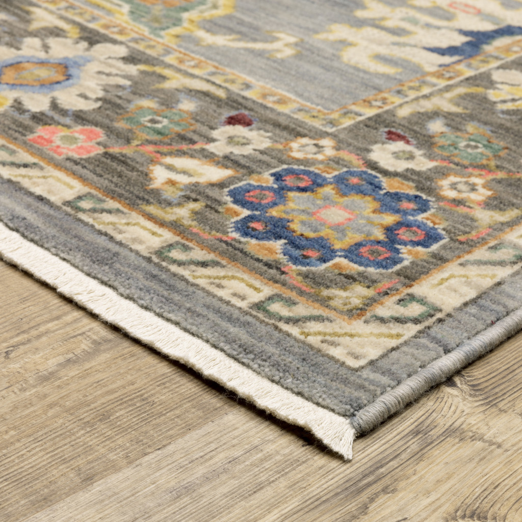 5" X 8" Blue and Ivory Oriental Power Loom Area Rug With Fringe