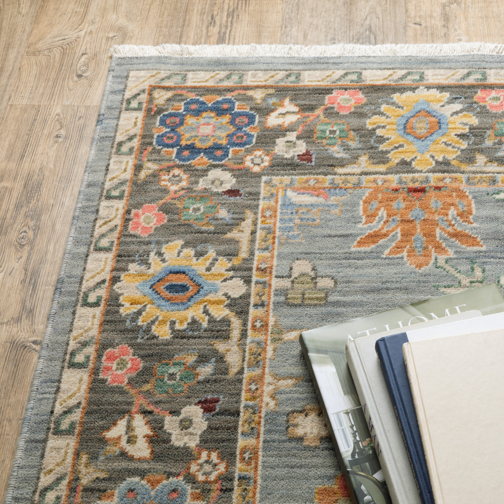 5" X 8" Blue and Ivory Oriental Power Loom Area Rug With Fringe