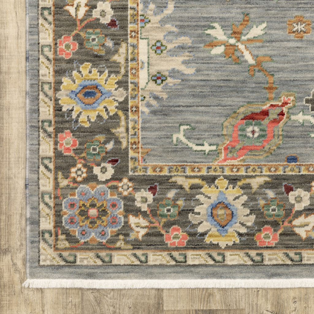 5" X 8" Blue and Ivory Oriental Power Loom Area Rug With Fringe