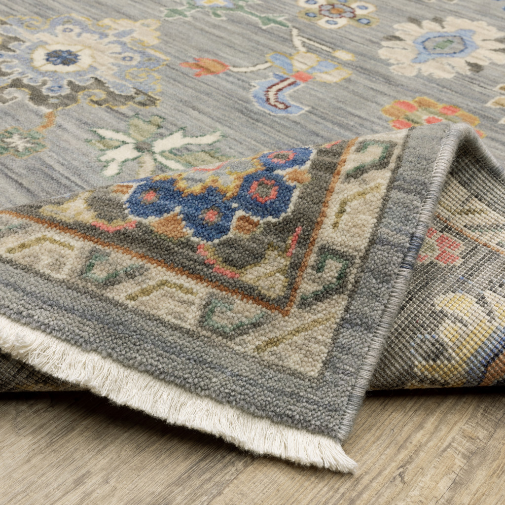 5" X 8" Blue and Ivory Oriental Power Loom Area Rug With Fringe