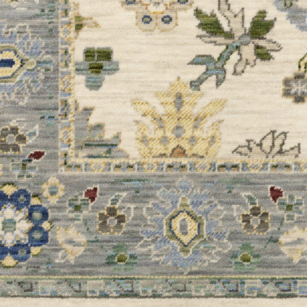 2" X 6" Ivory Blue Grey Teal Gold Green And Rust Oriental Power Loom Stain Resistant Runner Rug With Fringe
