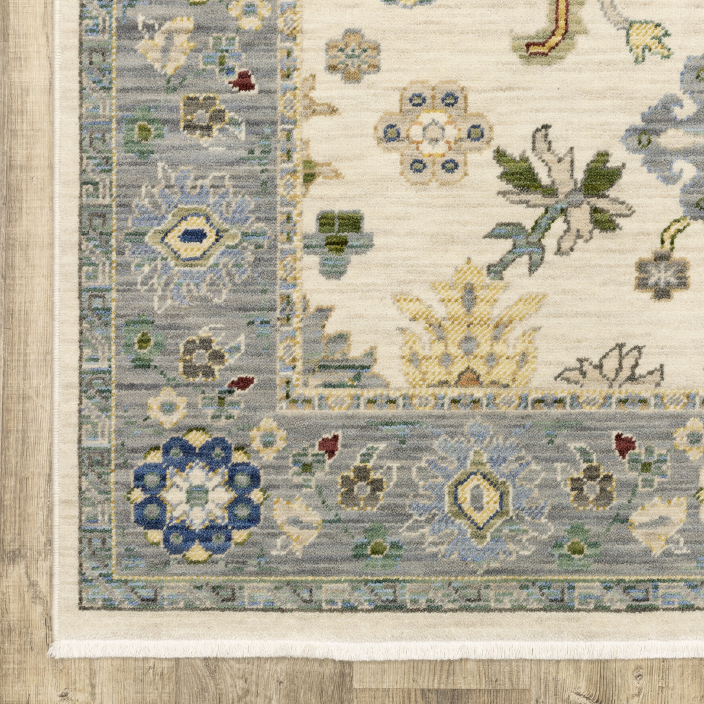 2" X 6" Ivory Blue Grey Teal Gold Green And Rust Oriental Power Loom Stain Resistant Runner Rug With Fringe