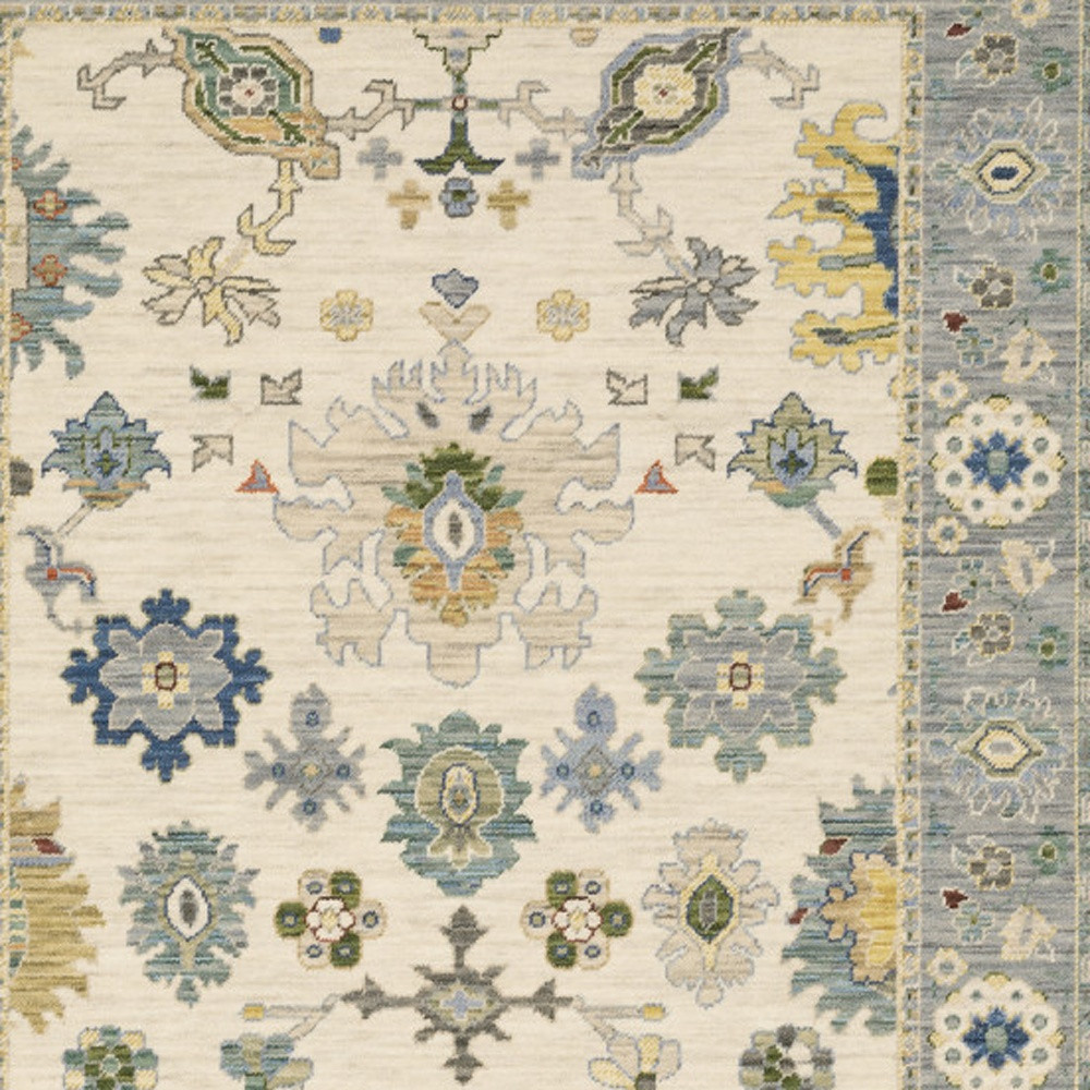 10" X 13" Ivory Blue Grey Teal Gold Green And Rust Oriental Power Loom Stain Resistant Area Rug With Fringe